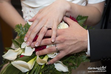 Photographe de mariage les alliances